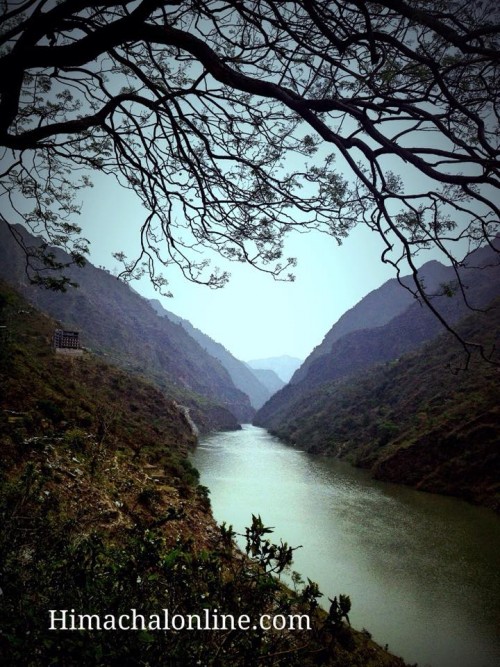 River Beas from Pandoh Dam, flowing alongwith high mountains.