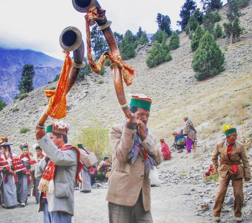 Men playing Narsinga instruments during the Sherkan festival in Kanam, kinnaur, Himachal Pradesh.
