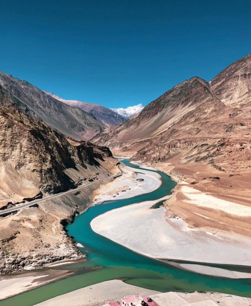 The Nimmu valley at the meeting point of the river, Indus and Zanskar, is as picture-perfect as it can get. Surrounded by dry bleached rocky terrains of the Zanskar gorge [popular trekking trail]