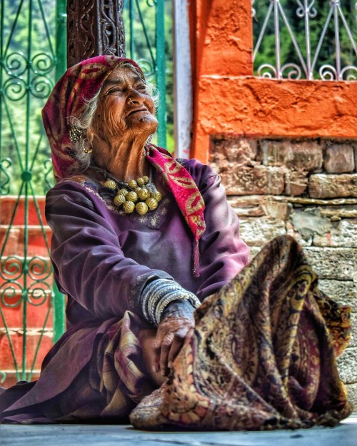 A Himachali Old Lady wearing the prettiest thing that is called smile.